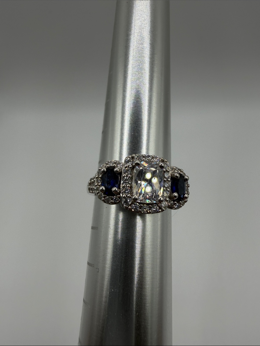 Sterling Silver 925 Halo Ring with Blue Sapphire Accent and Clear Center size 7